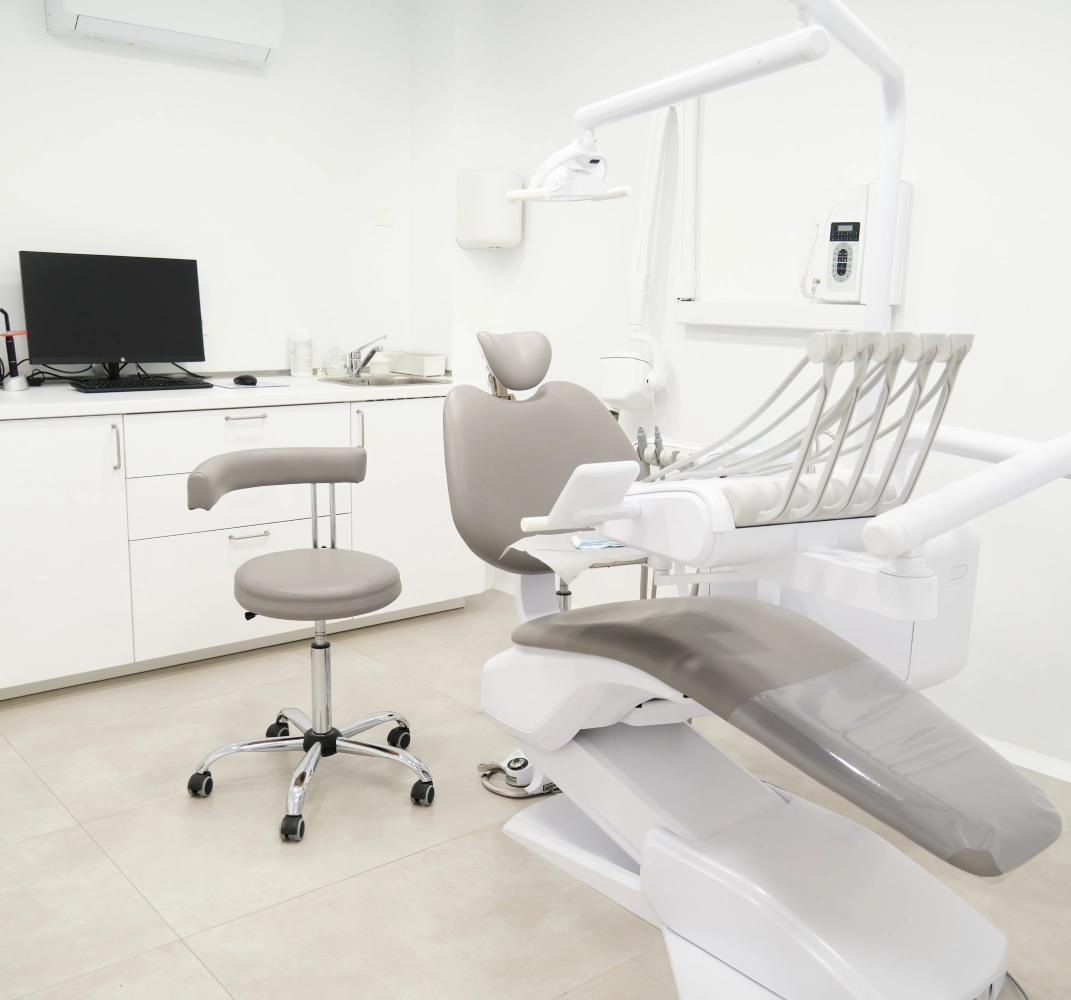Dental office with chair and equipment.