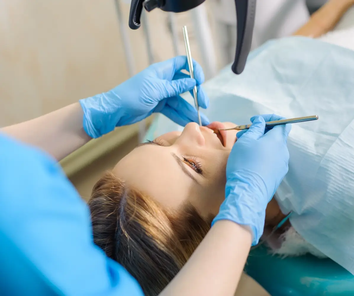 Dentist performing a dental check-up procedure.